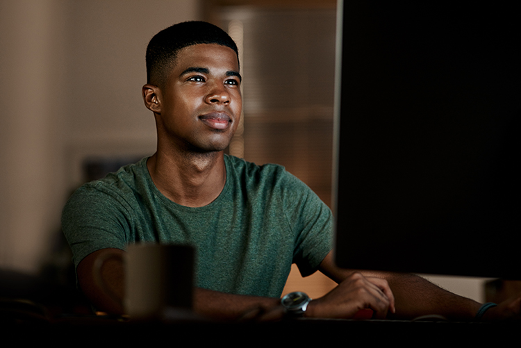 young man using computer